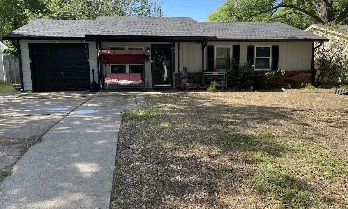 Metal Roof Installation crew at work on a residential roof in Alachua